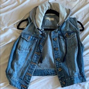 Denim vest with gray hood